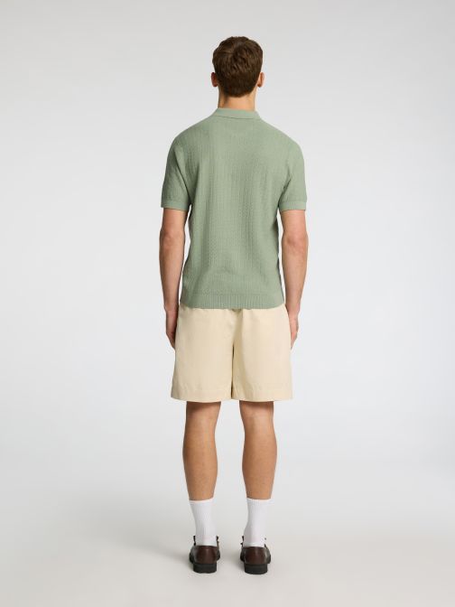 KNITTED HALF ZIP POLO SHIRT